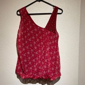 Free People. Sassy, sleeveless red asymmetrical top. Size Large.